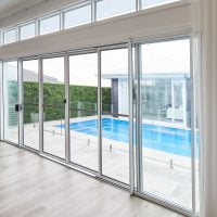 Horizon stacking door and stacking screen door in Pearl White